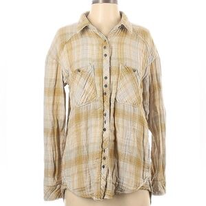 Soft flannel shirt by Free People.  Size small.  Side pockets.